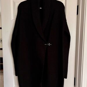 NWOT black midi length sweater with latch closure.  Size medium